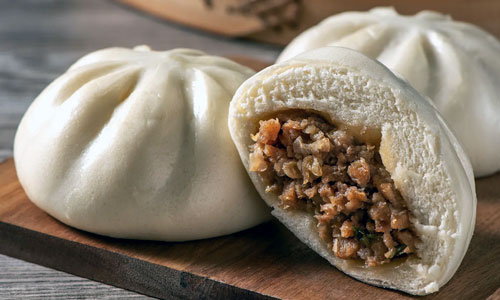 Warm steamed Bao Bun Classic containing roasted tofu