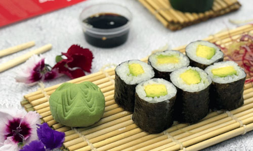 A plate of fresh Avocado Sushi Classic